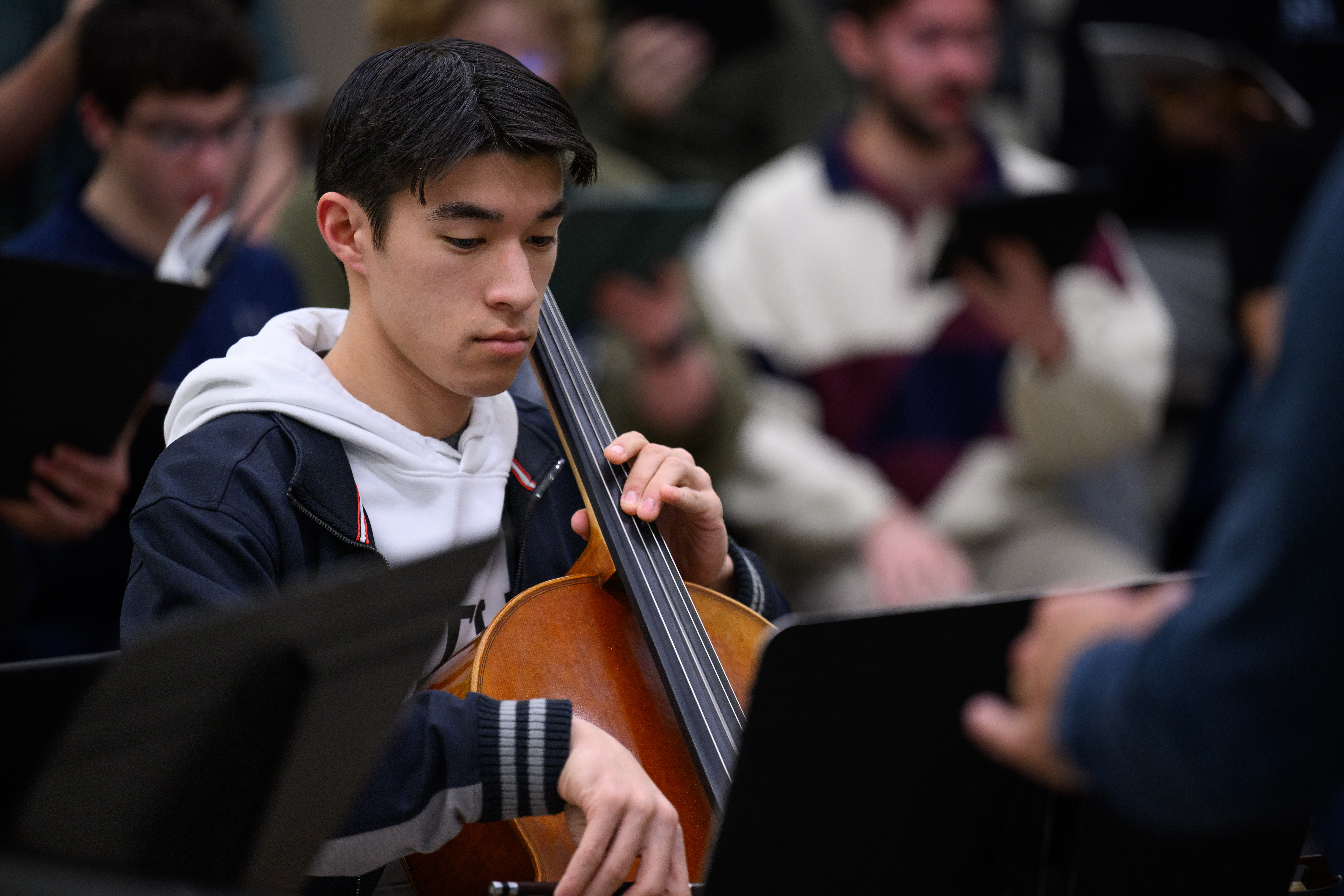 Student practicing on the violin.