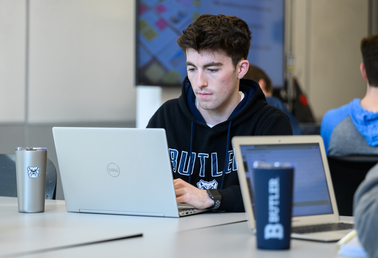 Butler student studying data science on computer