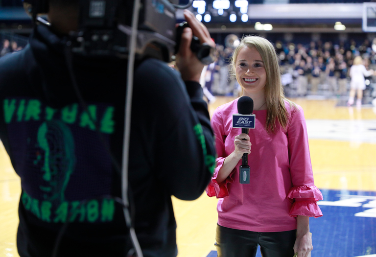 Photo of reporter at Butler University basketball event