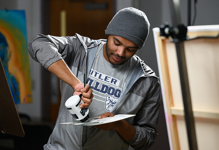 Photo of Butler Student painting